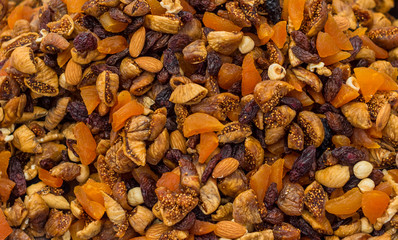 Mix of dry nuts and fruits close up