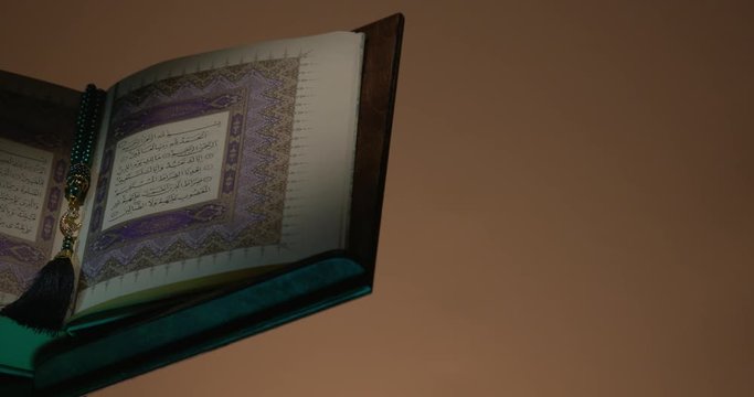 Holy Quran on Book Rest at Left Side with Prayer Beads Rotation
