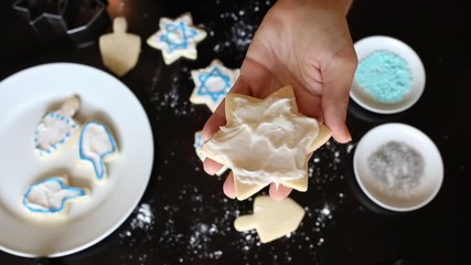 Hanukkah cookie decorating Star of David cookie close up