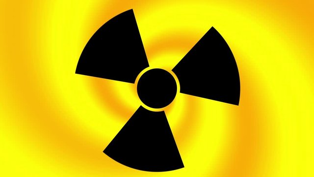 Spinning a radiation warning symbol. Looping footage.