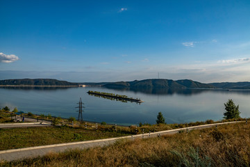 Obraz premium summer, evening, trip, journey, walk, vacation, urban, promenade, nature, forest, mountains, river, calm, water, paths, trees, grass, blue, sky, white, clouds, space, distance, expanse, coast, lightho