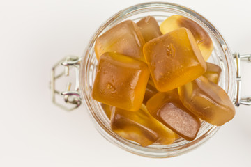 sweet gummy candy in a glass jar