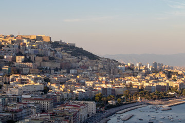Fototapeta na wymiar Naples Italy. 26 August 2019. The Gulf of Naples, in the foreground the castel dell'ovo and in the background the Vesuvius.