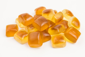 heap of brown and white sweet gummy candy