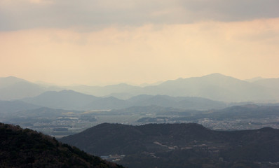 soft yellow color vanilla sky on mountain lines