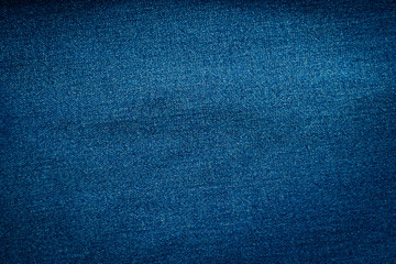 Macro, Close-up of texture details of denim blue jeans. Pattern of fabric or textile is abstract background. Concept design  fashion and retro stlye.