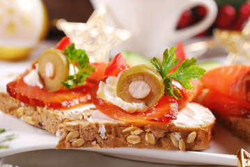 christmas canapes with salmon and cheese closeup