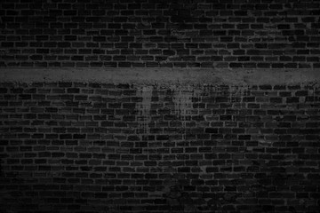 Black brick wall texture for background.