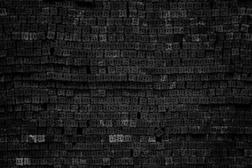 Black brick wall texture for background.