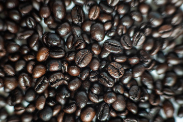 Roasted dark brown coffee bean cloe up