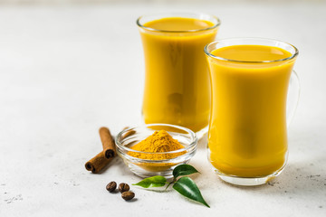 Turmeric golden milk cocktail. Selective focus, copy space.