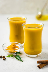 Turmeric golden milk cocktail. Selective focus, copy space.