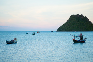 Fishing Boat on the coast at Sam Roi Yot beach Prachuap Khiri Khan in Thailand.