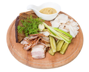 Assorted pork fat with pickles.