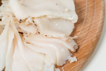 Assorted pork fat with pickles.