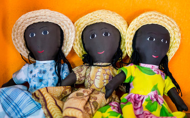 Row of rag dolls wearing traditional clothes, Madagascar