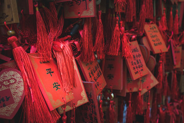 Red Chinese prayer charms