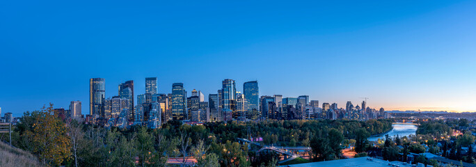 Skyline panoramic of Calgary, Alberta at sunset.