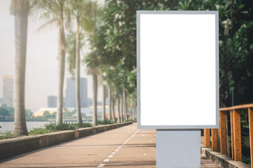 led blank billboard white screen side road in city. ad mockup copy space for advertising banner near bus stop in metropolis.