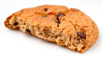 half oatmeal cookies on a white background