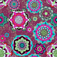 Seamless oriental background. Bright patterns in the style of Indian mehndi.