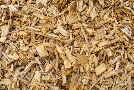 Background made of wood chips, closeup shot, wooden texture.