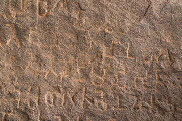 Inscriptions of Emperor Ashoka on rock boulder at Maski, Raichur, India - obrazy, fototapety, plakaty