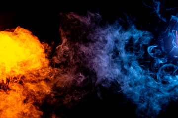 Red and Blue abstract colored smoke on black background