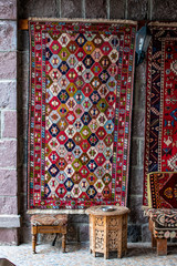 Turkey, Middle East: Turkish rugs hand knotted according to ancient tradition on display in a shop of Dogubayazıt, on the road to Mount Ararat, Agri Dagi, the resting place of Noah's Ark 