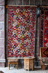 Turkey, Middle East: Turkish rugs hand knotted according to ancient tradition on display in a shop...
