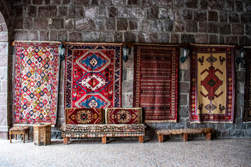 Turkey, Middle East: Turkish rugs hand knotted according to ancient tradition on display in a shop...