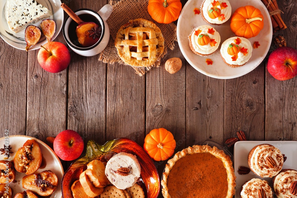 Poster autumn food double border. table scene with a selection of pies, appetizers and desserts. top view o
