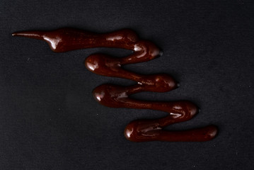 bbq sauce on the black background