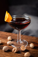 cocktail with nutmeg on the wooden table