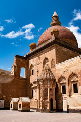 Fototapeta na wymiar Dogubayazıt, Turkey: the courtyard with the Tomb and main dome of Ishak Pasha Palace, semi-ruined palace of Ottoman period (1685-1784), one of the most magnificent historical buildings of the country
