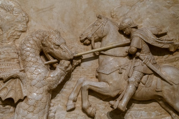 Ancient medieval bas-relief on a stone