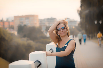 Portrait of a beautiful, sexy, cute girl on the street in the city.