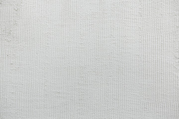 Fototapeta na wymiar White painted stucco wall. Background texture