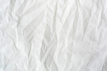 white color creased paper tissue background texture.