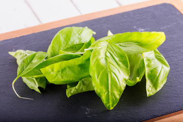 Basil over chopping board