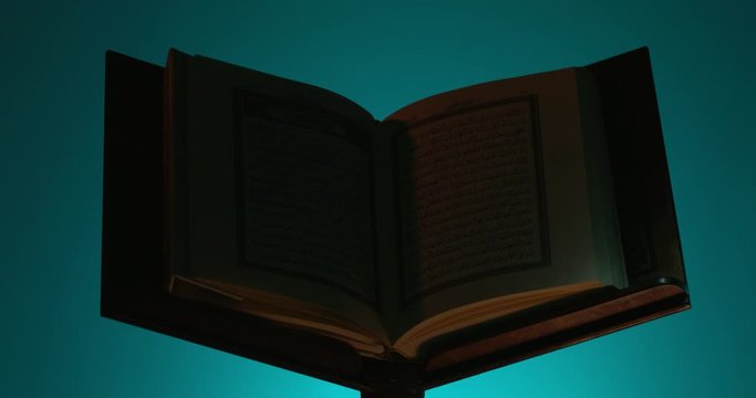 Light Passing over Holy Quran on Book Rest 3