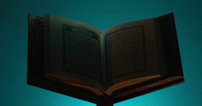 Light Passing over Holy Quran on Book Rest 4