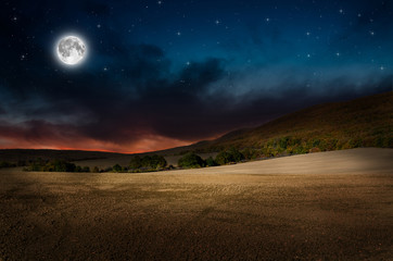 Naklejka na ściany i meble night background and full moon