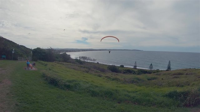 Paraglider Paragliding.People Watching Para Glider Flying.Outdoor Leisure Activity Sport