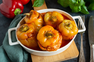 Pepper stuffed with minced meat and rice in tomato sauce.