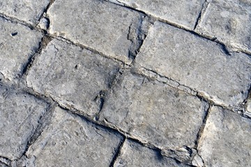 Diagonal drawing of an old pavement as a background.