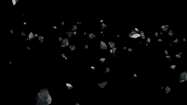 Flying chunks of rock on a black background.mov
