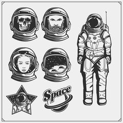 Space and astronaut emblems, labels and design elements. Man, girl and skull in a space suit. Vintage style. Monochrome design. © malashkos
