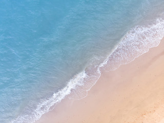 Blue sea and white sand beach in summer landscape for web advertisment and poster background.Aerial view of seashore coastline by drone