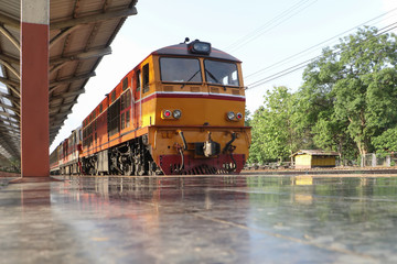 Diesel train at railway station.Diesel locomotive is a type of railway locomotive in which the prime mover is a diesel engine.
